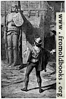 [picture: A giant wooden statue of a warrior with shield and sword]