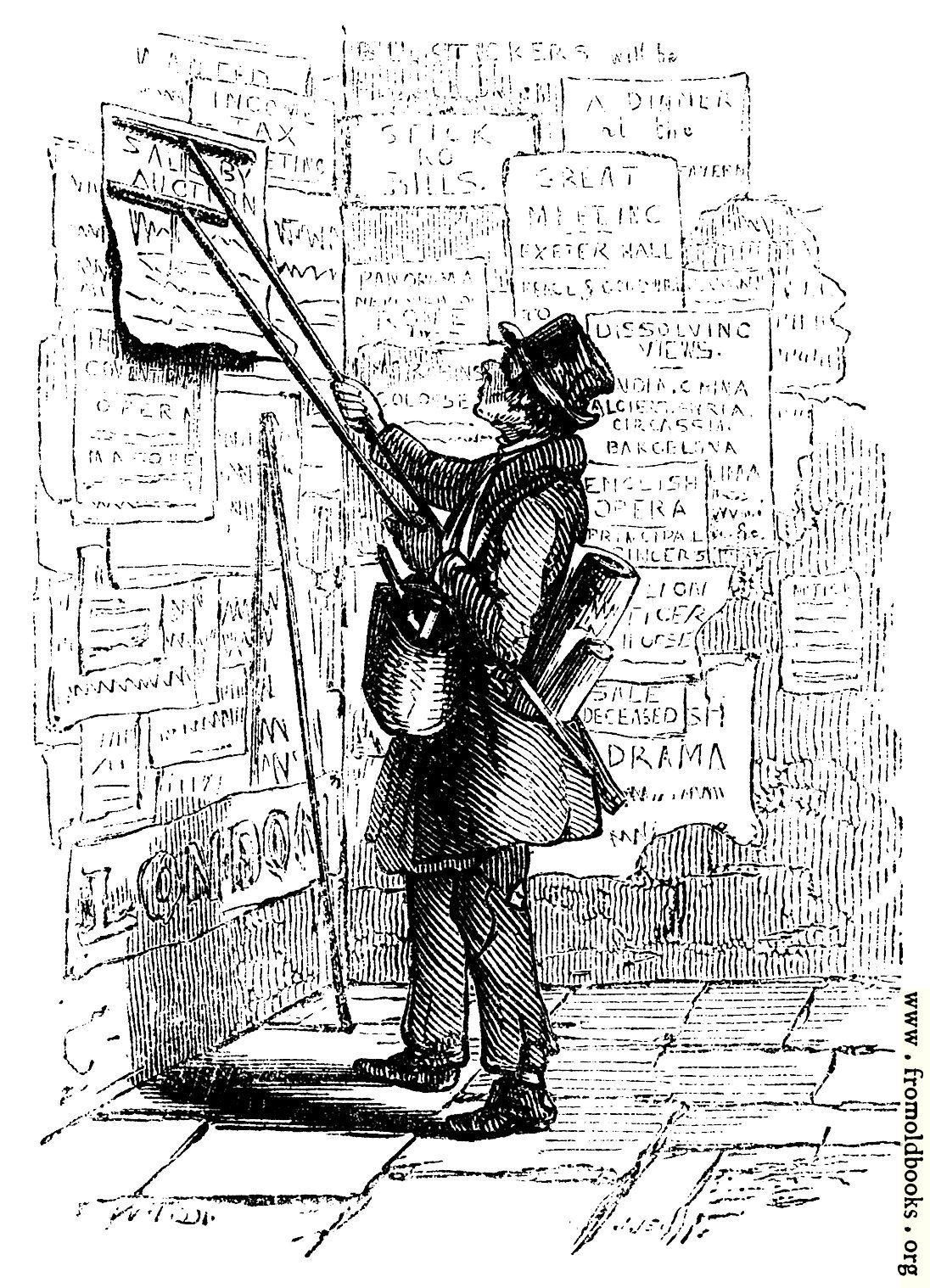 [Picture: Man putting up a poster]