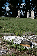 [Picture: Old book on gravestone]