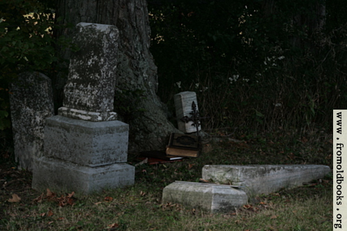 [Picture: Old family bible in country churchyard]