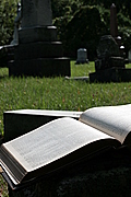 [Picture: Open book with tombs]