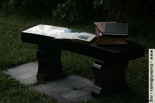 [Picture: Stone bench with books 2]