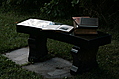 Stone bench with books 2