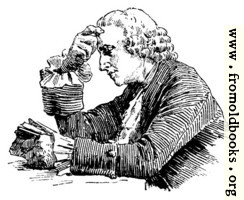 [picture: Man reading at a table]