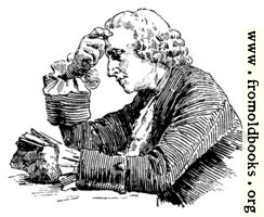 [picture: Man reading at a table]