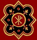 [Picture: Chi-rho symbol (Px) in red, black ad gold from front cover.]