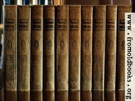 Green and Gold books on polished wood