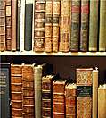 Pictures of old books: Two shelves of antiquarian books